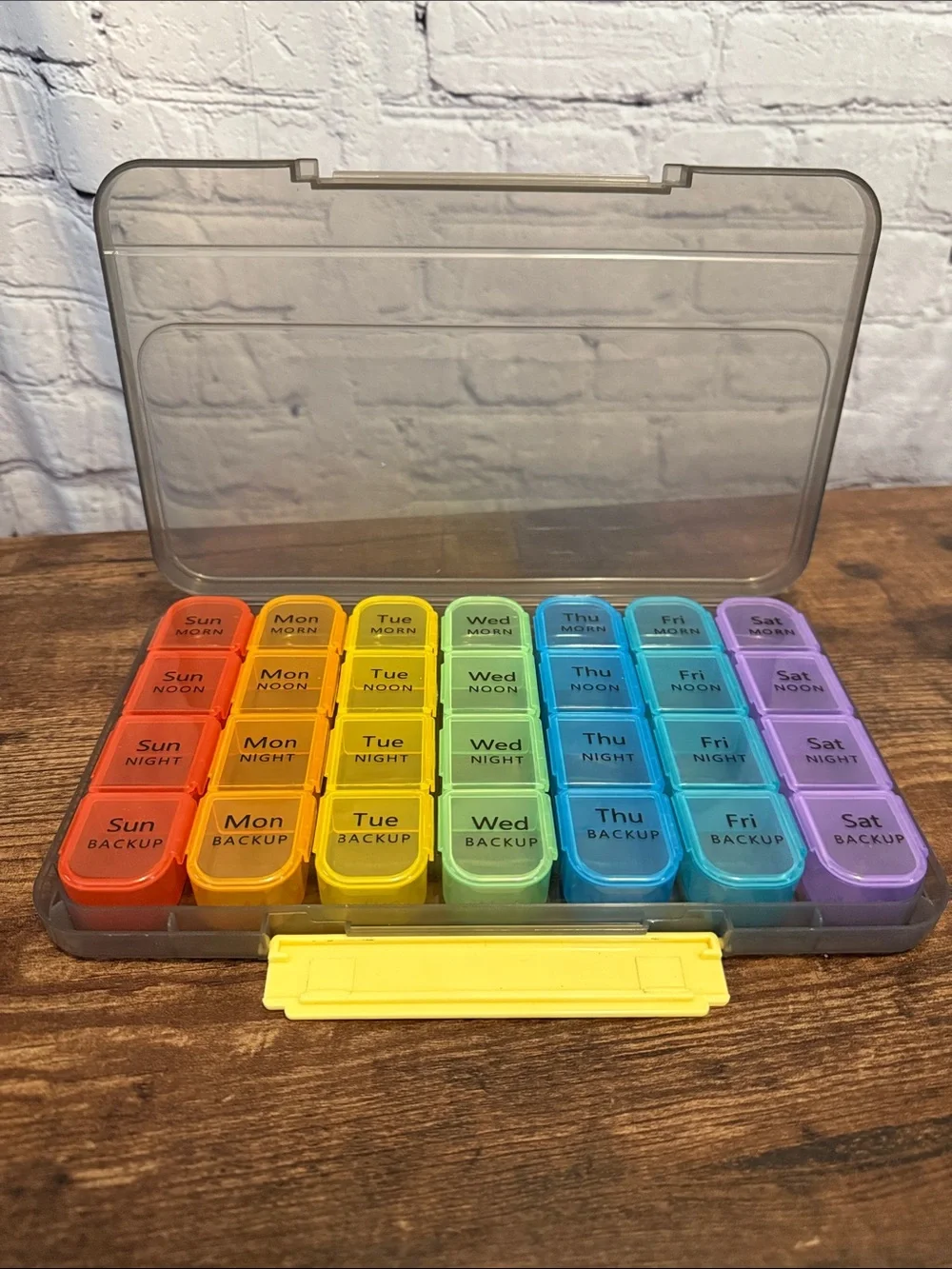 Rainbow Weekly Pill Organizer with Yellow Latch